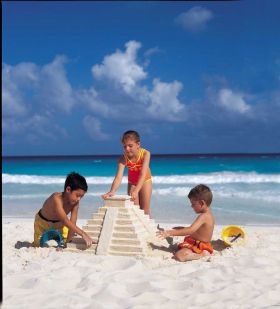 Children building a Mayan temple on the beach at Cancun, Mexico – Best Places In The World To Retire – International Living