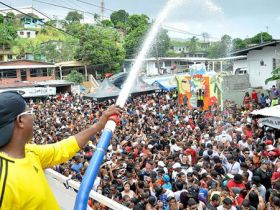 Dousing people with a hose at Panama Carnival – Best Places In The World To Retire – International Living