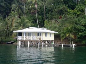 Anne-Michelle Wand Bocas Del Toro, Panama house on stilts over ocean – Best Places In The World To Retire – International Living