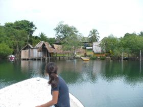 Anne-Michelle Wand Bocas Del Toro, Panan boat approaching village – Best Places In The World To Retire – International Living