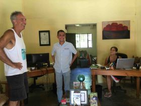 Chuck Bolotin with Armando Contreras at his office in Lo de Marcos, Nayarit – Best Places In The World To Retire – International Living