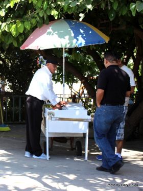 Vendor selling Tejuíno - a cold beverage made from fermented corn – Best Places In The World To Retire – International Living