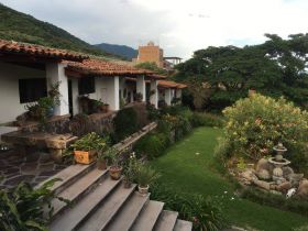 Home in Jocotepec, garden and home view – Best Places In The World To Retire – International Living