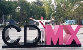 Greg Gunter standing by a CDMX sign – Best Places In The World To Retire – International Living