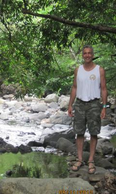 Man near a stream at Altos del Maria, Panama – Best Places In The World To Retire – International Living