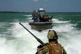  US miliatary and Belize National Coast guard during joint river operations – Best Places In The World To Retire – International Living