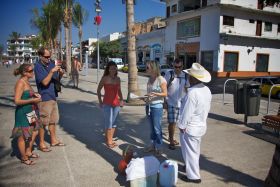 Clients of Vallarta Food Tours find Tuba by Conception  selling mixed fruit and nut drinks on the street, Puerto Vallarta, Mexico – Best Places In The World To Retire – International Living