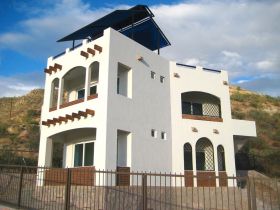 Electric poles seen in background of house designed and built by Jabre Construccion, La Ventana, Baja California Sur, Mexico – Best Places In The World To Retire – International Living