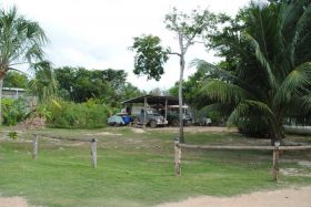 Four wheel drive vehicles parked at Cerros Sand Beach Resort, Corozal, Belize – Best Places In The World To Retire – International Living