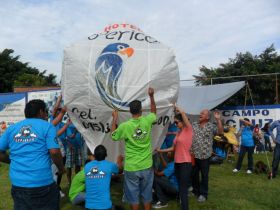 Friends helping Hotel Perico get the globo up, Ajijic, Mexico – Best Places In The World To Retire – International Living