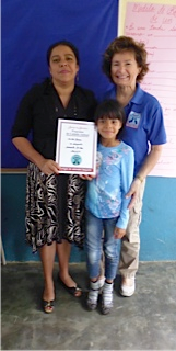 Girl receiving an award from Amigos de Animales,  Boquete, Panama – Best Places In The World To Retire – International Living