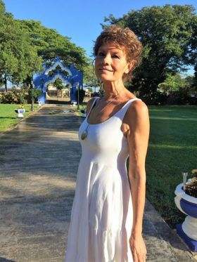 Iona Chamberlain in the garden entryway of her bed and breakfast, Hacienda San Pedro Nohpat, outside Merida,  – Best Places In The World To Retire – International Living