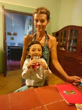 Iona Chamberlain with the son of Tere Duran, one of her staff, Hacienda Nohpat San Pedro, near Merida, Mexico – Best Places In The World To Retire – International Living