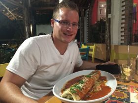 Marissa Lolk's husband and the generous portions of his burrito, Nicaragua  – Best Places In The World To Retire – International Living