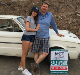 Mark Eagar and his beautiful daughter in front of one of the lots he has for sale, near Ajijic, Mexico – Best Places In The World To Retire – International Living