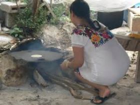 Mayan woman cooking over a wood fire, Mexico – Best Places In The World To Retire – International Living