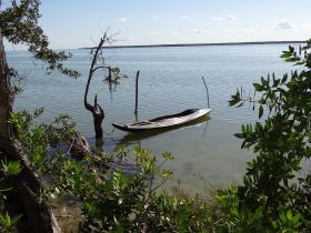 Native boat in Chetumal Bay, Belize – Best Places In The World To Retire – International Living