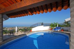 Partially covered tiled roof over the pool that overlooks the ocean in Puerto Vallarta, Mexico – Best Places In The World To Retire – International Living