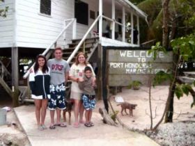 Family on the beach in Belize – Best Places In The World To Retire – International Living