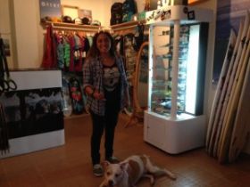 Samanta Alanso with Chispa in surf shop Los Bolvedas, Casco Viejo, Panama – Best Places In The World To Retire – International Living