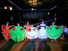 Students from San Juan del Sur Day School perform native dances at  El Timon, a restaurant in San Juan del Sur, Mexico – Best Places In The World To Retire – International Living