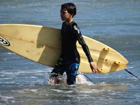 Surfer boy El Palmar near Coronado, Panama – Best Places In The World To Retire – International Living