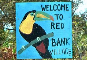 Welcome sign for Red Bank Village, Stann Creek, Belize