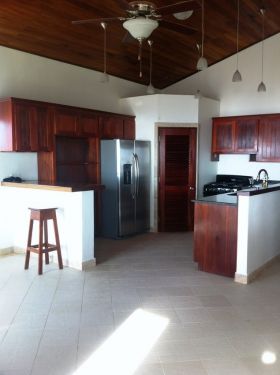 Custom cabinetry and mahogany doors at Vision Properties Belize – Best Places In The World To Retire – International Living