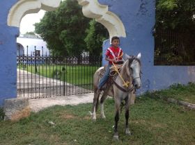 A little boy in front of Iona Chamberlain's Hacidnda San Pedro Nohpat, outside of Merida, Mexico – Best Places In The World To Retire – International Living