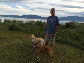 Chuck Bolotin with two dogs near Lake Chapala, Mexico