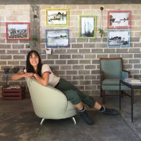 Jet Metier posing in a comfortable couch in Mexico