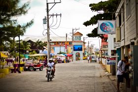 San Pedro Ambergris Caye street with motorcycle and other vehicles – Best Places In The World To Retire – International Living