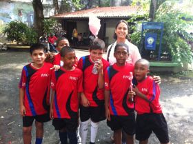Patrizia Pinzon with boy's soccer team, Casco Viejo, Panama – Best Places In The World To Retire – International Living