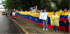 Protestors from Venezuela against the President of Venezuela, Nicolás Maduro, attending Juan Carlos Varela’s presidential inauguration, Panama City, Panama, pictured