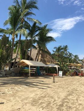 Sayulita Beach with stored surf boards