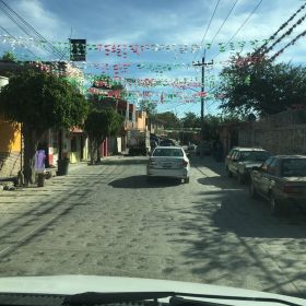 Street with fiesta decorations in Mexico