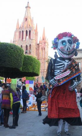 Dia de Muertos celebration in San Miguel de Allende with parroquia in the background – Best Places In The World To Retire – International Living