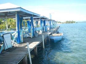 Boats by a dock in Bocas del Toro, Panama – Best Places In The World To Retire – International Living